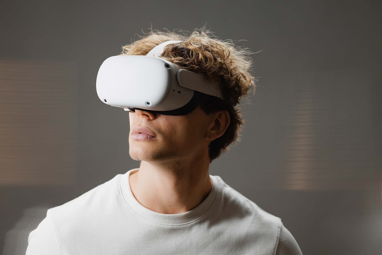 A young man wearing a VR headset