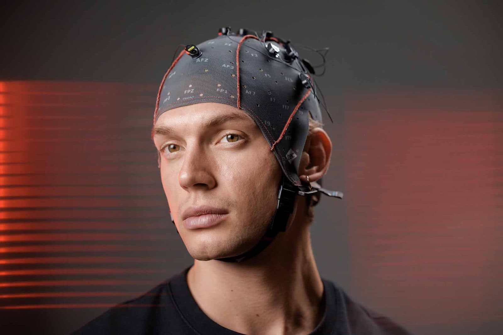 A participant wearing an EEG cap