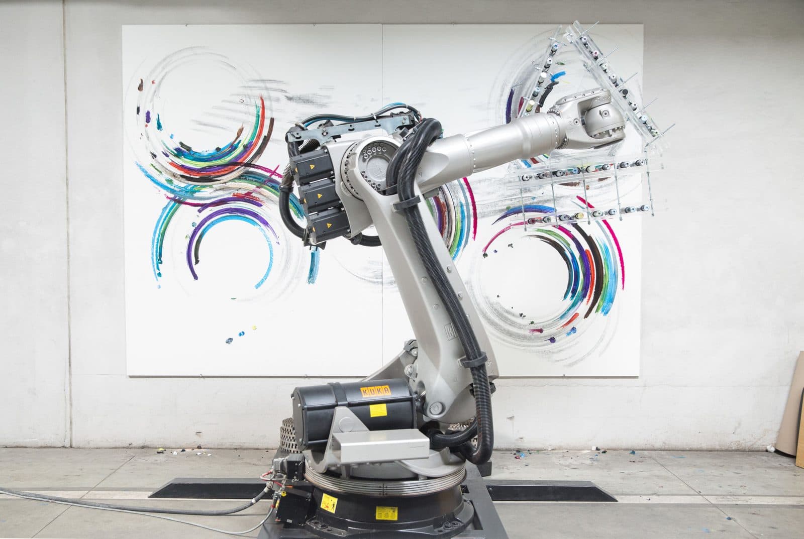A robot arm painting at Ars Electronica