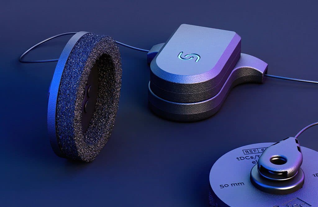 The Unicorn tDCS Core-2 stimulator and a sponge electrode, close up