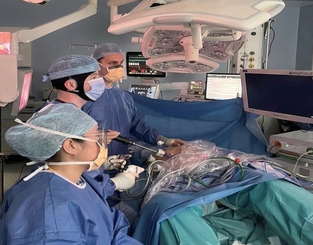 A surgeon wearing LUMO during an operation